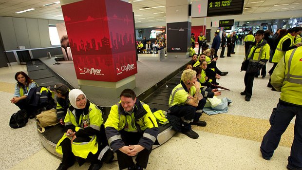 Qantas staff on strike at Tullamarine airport.
