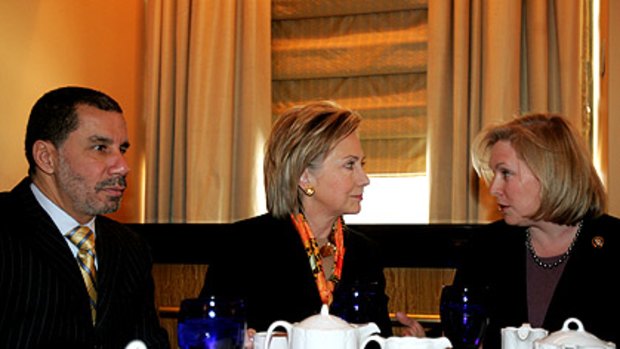 Eye to eye?: Senator-designate Kirsten Gillibrand (right) and Secretary of State Hillary Clinton at a lunch meeting with New York Governor David Paterson at the Waldorf-Astoria Hotel in New York City.