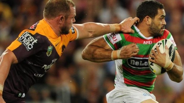 A handful: Greg Inglis was hard to stop.