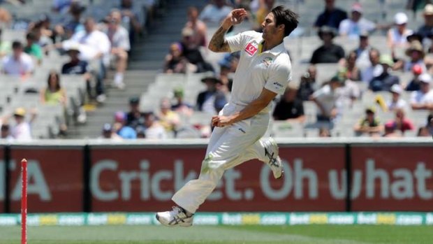 Mitchell Johnson charges in against Sri Lanka at the MCG on Friday. Johnson made 92 not out and captured six wickets for the match.