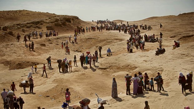 Lynsey Addario has covered conflict but also the plight of those fleeing the fighting, such as the thousands of Syrians crossing from Syria into Northern Iraq in August 2013.
