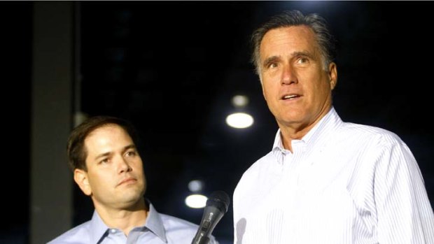 Timely jolt ... Florida senator Marco Rubio, left, onstage with Republican presidential hopeful Mitt Romney this week.