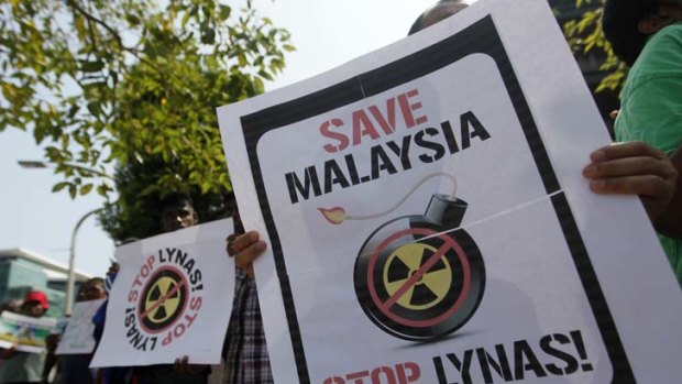 Malaysian protests over health and environmental impacts of the refinery kiln.