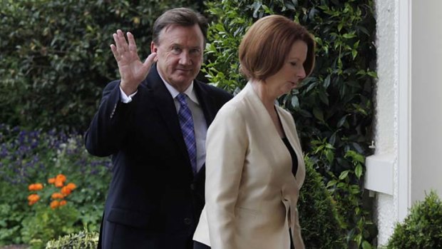 Unfairly questioned: Tim Mathieson and Julia Gillard.