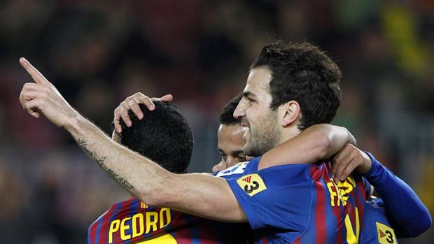 Barca belting: Barcelona players celebrate a goal in their 9-0 Copa del Rey win.