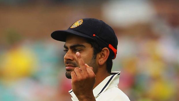 Virat Kohli has alleged on Twitter that comments about his family sparked rude gesture.