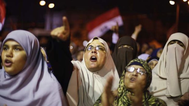 Supporters of the deposed Egyptian President Mohamed Mursi shout anti-army slogans.