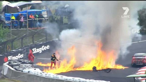 A fireball engulfs the track after Dick Johnson Racing driver David Besnard crashed his Falcon.