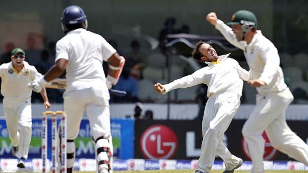 Come in spinner: Australian bowler Nathan Lyon, (second right), celebrates the dismissal of Sri Lanka's Kumar Sangakkara.