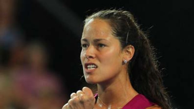 Ana Ivanovic reacts after a return of service.