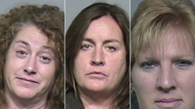 Three of the woman allegedly involved in an assault on a US man who was having an affair with four women at once, including his wife (not pictured). The woman, from left to right, are Michelle Belliveau, 43; Therese Ziemann, 48, and Wendy L. Sewell, 43.