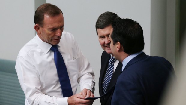 Some of the MPs describing themselves as Tony Abbott's 'deplorables'. Recently promoted Victorian MP Michael Sukkar (right) and former cabinet minister Kevin Andrews (centre) with former prime minister Tony Abbott. 