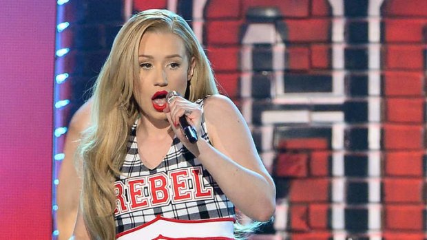 Iggy Azalea performing on stage.