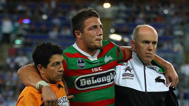 Sam Burgess is assisted from the field in the 63rd minute with a suspected broken left ankle.