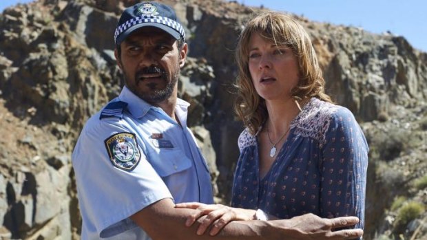 New ground: Lucy Lawless as Alex Wisham in the code, with Aaron Pedersen as Tim Simons.