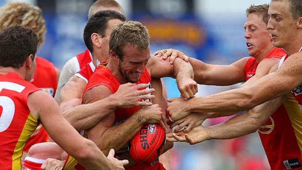 Reddy: Suns and Swans take on each other's hues in the Southport practice match earlier this year.