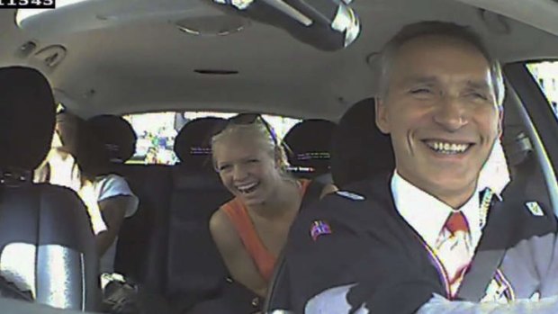 Norwegian Labour Party shows Norwegian Prime Minister Jens Stoltenberg (right) acting as a taxi driver in Oslo, Norway as a part of the election campaign.