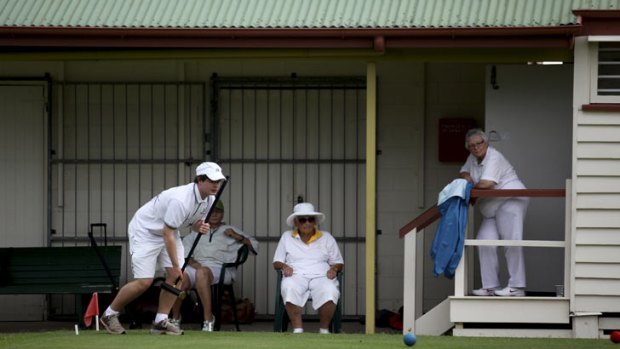 Greg Fletcher, 20, from Lismore, Victoria, are competes in the Australian Croquet Championships held at the Toombul Croquet Club.