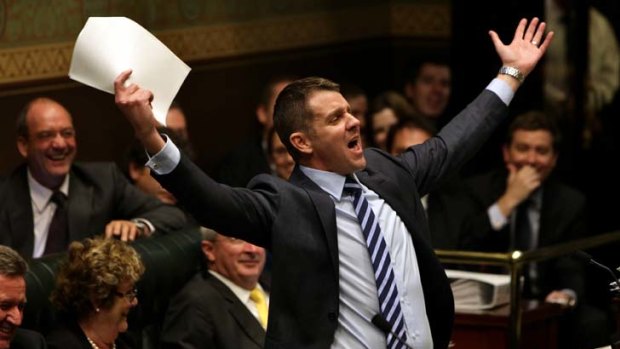 Challenging times ... the Treasurer, Mike Baird, during question time yesterday.