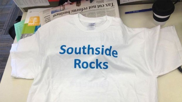 Merchandise war ... Gai Brodtmann handed out these t-shirts to the Parliament press gallery today.