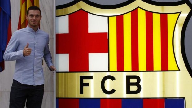 Barca bound: Belgian defender Thomas Vermaelen checks in at the Camp Nou on Saturday.