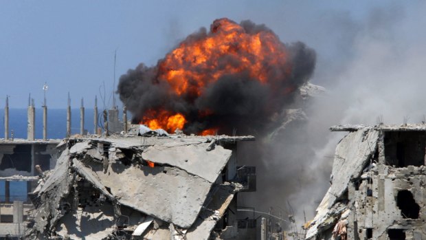 Smoke and fire rise from the besieged Palestinian Nahr al-Bared refugee camp near Tripoli in northern Lebanon in 2007 after it was bombarded by Lebanese forces.