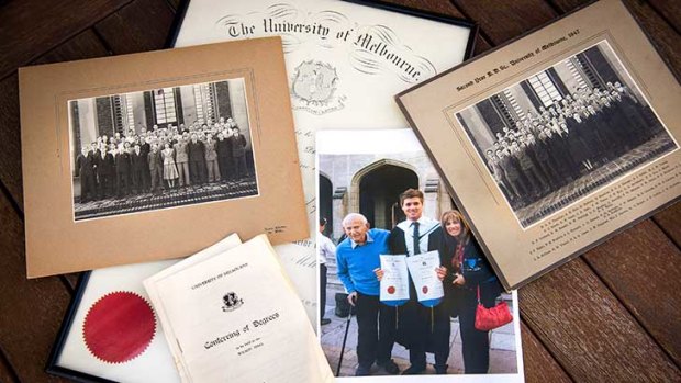 Images from the past and recent past: three generations of Melbourne graduates (photographed l-r Dr Aaron Krause, Matt Hale and Robyn Krause-Hale) with mementos from Dr Krause's student life and graduation. Photo: Peter Casamento.