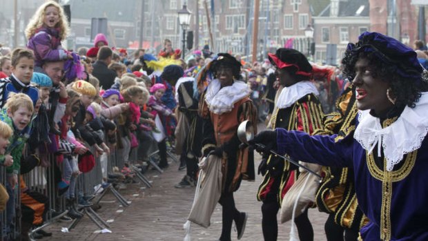 The Dutch version of Santa Claus, Sinterklaas, or Saint Nicholas, and his blackface sidekicks "Zwarte Piet" or "Black Pete" arrive by steamboat in Hoorn, north-western Netherlands.
