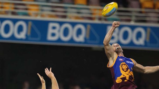 Brisbane's Matt Maguire (right) has been backed to kick the first goal of a game before the starting team lists were named, according to a bookie.