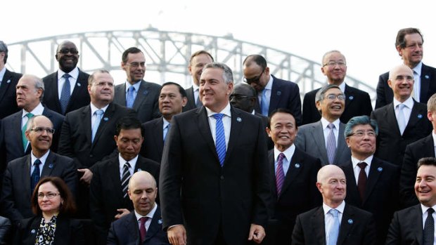 Joe Hockey stands in front of G20 finance ministers and central bank governors for the obligatory group photo.