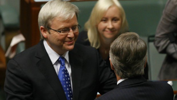 Got the balance right ... Prime Minister Kevin Rudd shakes hands with Federal Treasurer Wayne Swan.