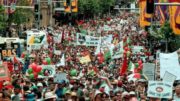 People power: Souths fans and supporters of the game march along George Street in 2000.