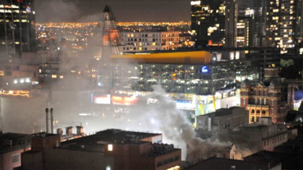 theage.com.au reader Rod Hoad took this photograph of smoke rising from Wing Loong Chinese restaurant from his Russell Street unit.