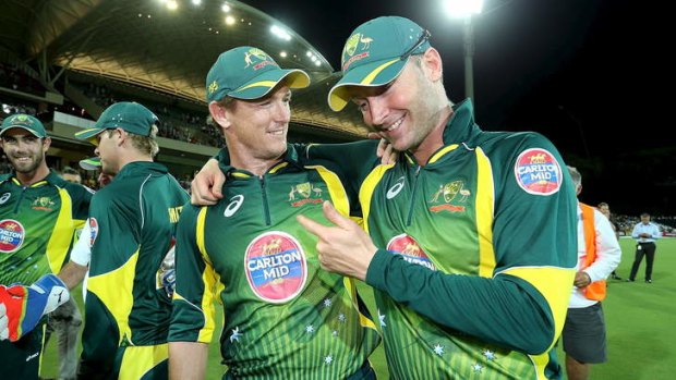 On a high: Michael Clarke and George Bailey celebrate winning the One-Day International against England.