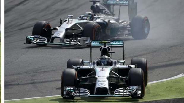 Lewis Hamilton takes the lead after Mercedes teammate Nico Rosberg misses the chicane during the Italian Grand Prix at Monza on Sunday.