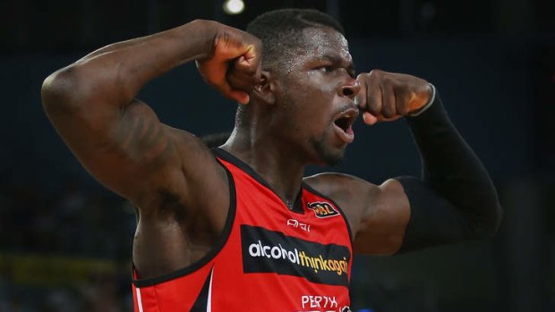 Perth import James Ennis celebrates after shooting a basket during the round 16 NBL match against the Melbourne Tigers at Hisense Arena.