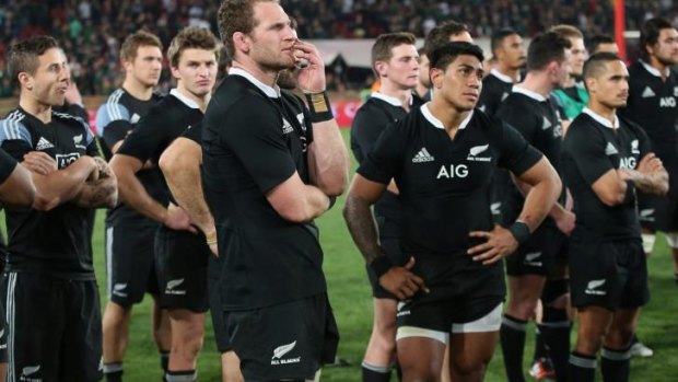A dejected All Blacks team reflect after the loss.
