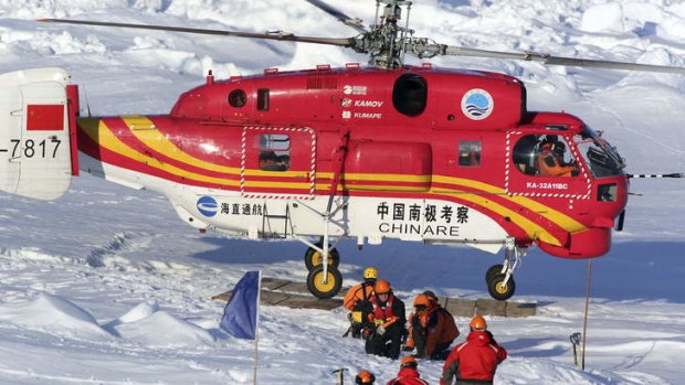 Australian and Chinese rescuers assist stranded crew.