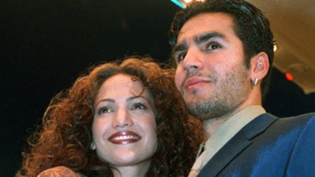 Jennifer Lopez arrives with then husband Ojani Noa at a film premiere on April 7, 1997.