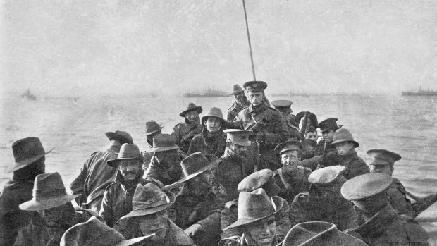 A lifeboat carrying unidentified men of the Australian 1st Divisional Signal Company being towed towards Anzac Cove at 6am on the day of the landing.