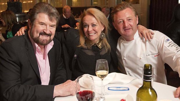 All go ... Derryn Hinch and Jacki Weaver with Luke Mangan at Glass on Friday.