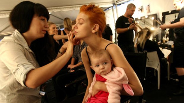 Fashion forward... model Tiah Eckhardt and her five-month-old daughter backstage.