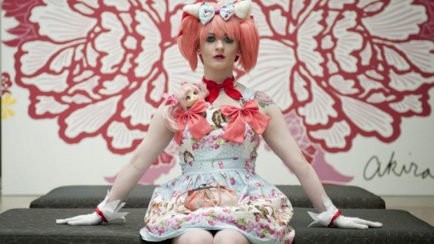 Claire Fulton poses for a portrait during the preview of 'Future beauty: 30 years of Japanese fashion' exhibition at GOMA.