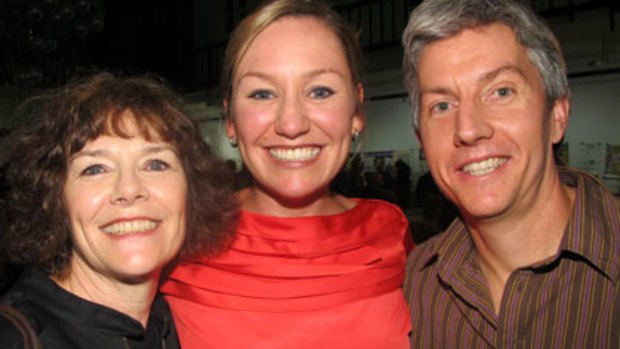 Queensland’s likely first Greens senator Larissa Waters (centre) celebrates with husband Brendan O’Malley and mother Lorraine Waters.