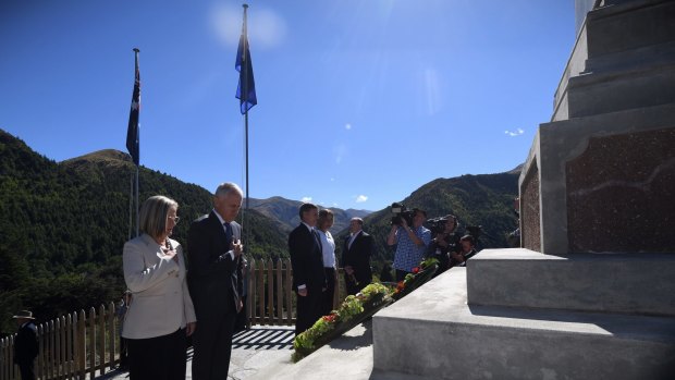 Prime Minister Malcolm Turnbull with his wife Lucy lay a wreath at the war memorial in Arrowtown near Queenstown, New Zealand on Friday.