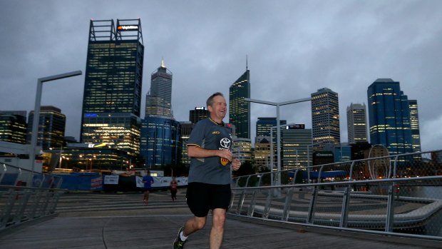 Opposition Leader Bill Shorten during a 10km morning run along the Swan River in Perth.
