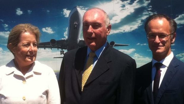 Brisbane Airport Corporation CEO Julieanne Alroe, deputy prime minister Warren Truss and sand dredging manager Yves Bosteels at Brisbane Airport.