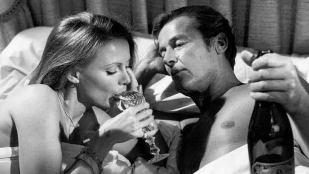 Bond (Roger Moore) combines two of his favourite vices.