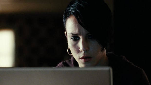 A screen near you: Far from mere fiction, ''hacktivists'' (as played by Noomi Rapace in The Girl with the Dragon Tattoo), have Australian websites scrambling for stronger online security.