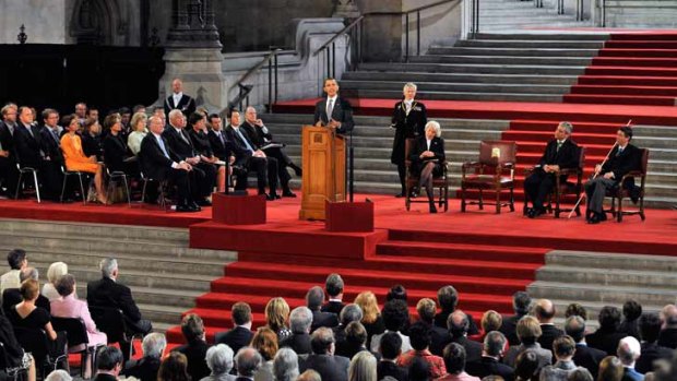 U.S. President Barack Obama delivers a speech to both Houses of Parliament during the second day of his state visit in London. Obama was granted the honor of being the first U.S. president to speak from the grand setting of Westminster Hall, and he received a deeply friendly welcome. (AP Photo/Andy Rain, pool)